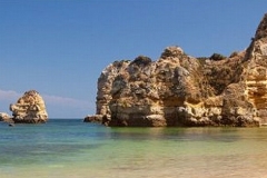 A rock formation with nice beach in the Algarve.