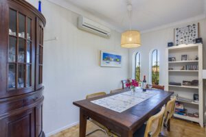 Dining area with crockery, games, books, radio, CD player and of course your bottle will be ready when you arrive from Faro